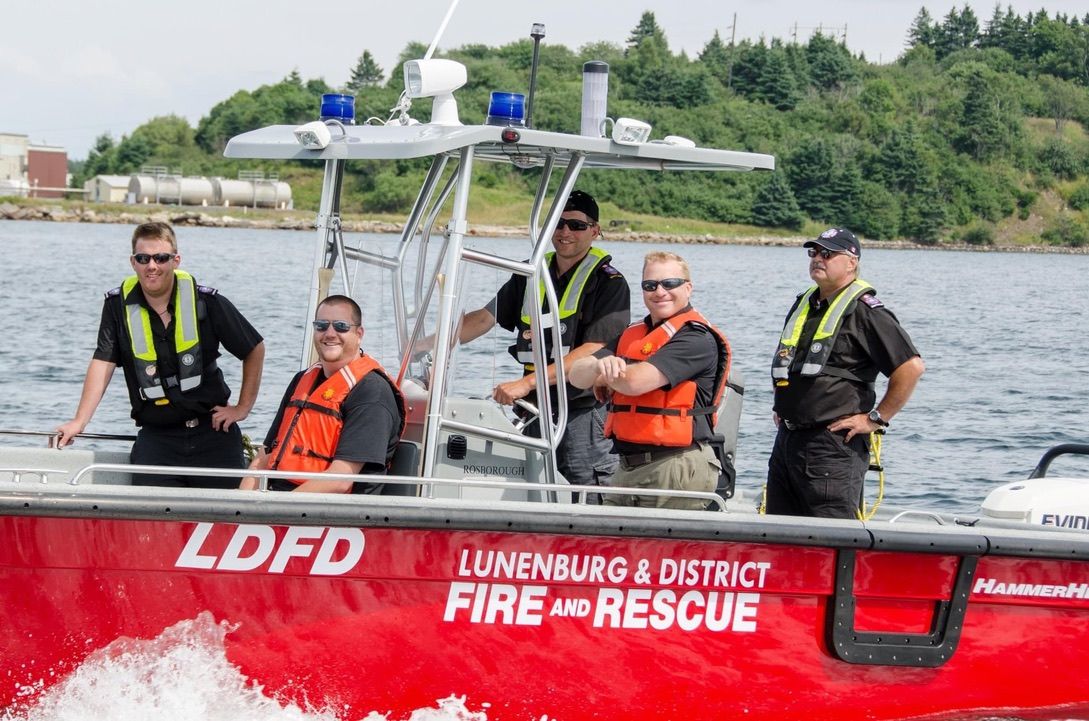 Five members of Lunenburg and District Fire and Rescue aboard the department's rescue boat